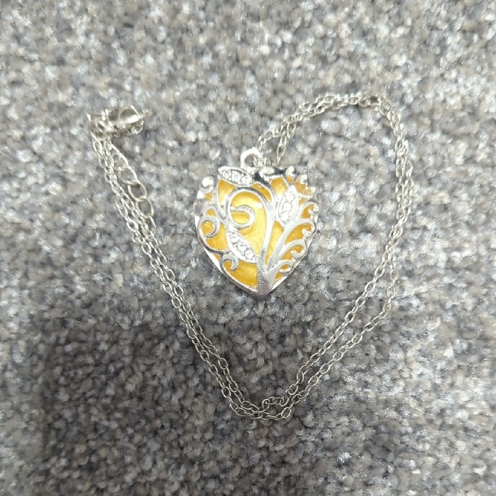 Elegant Silver and Gold Heart Pendant Necklace